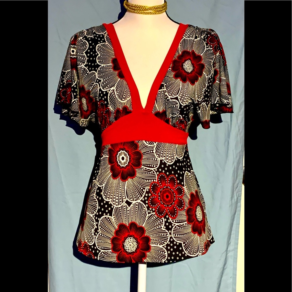 TEMPTED Flutter Sleeve Deep V Top
A23